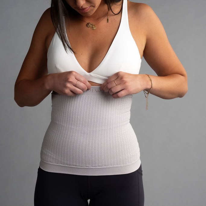 Body Sleeve rundt midjen under en topp